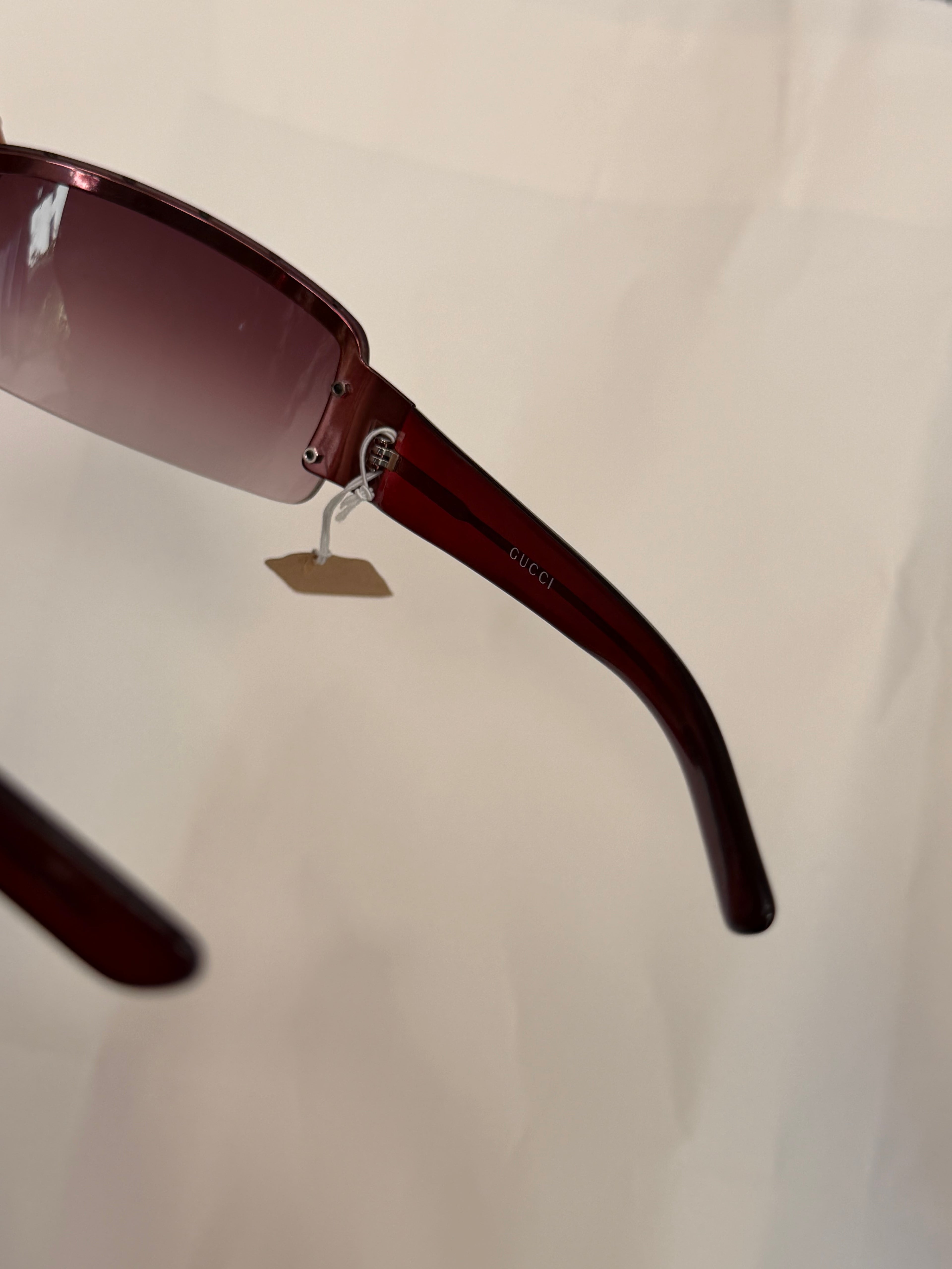Gucci Studded GG Sunglasses in Dark Purple