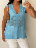 Knitted light blue vest size L