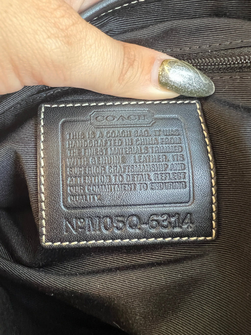 Coach Soho Signature Flap in Black