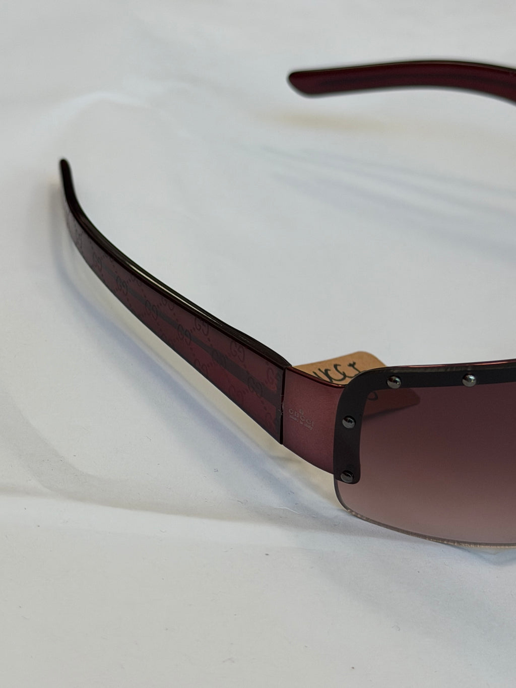 Gucci Studded GG Sunglasses in Dark Purple