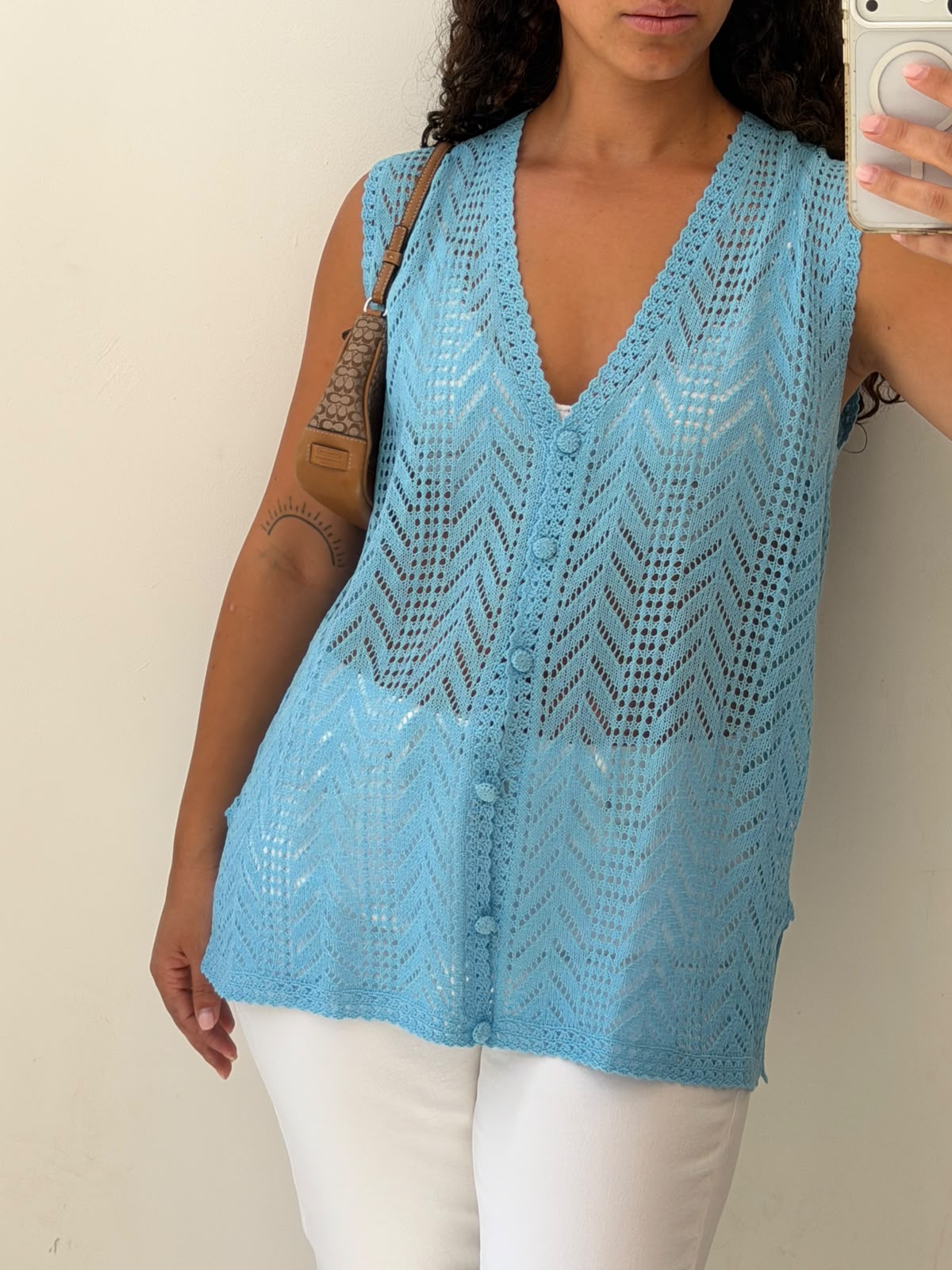 Knitted light blue vest size L