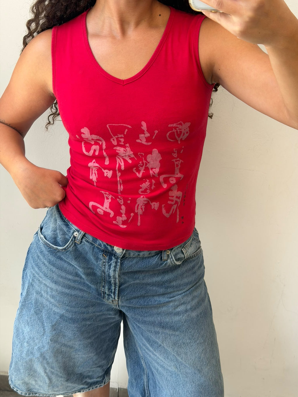 Red v-neck tank top size XS