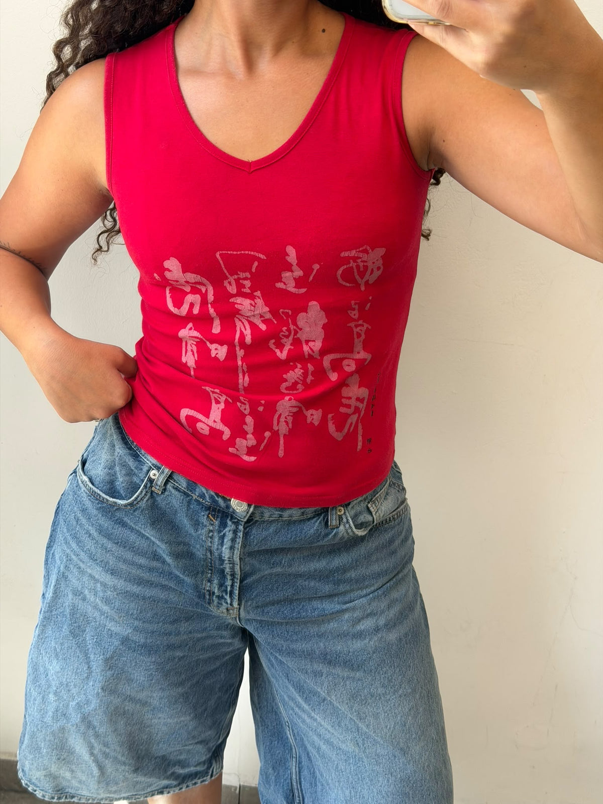 Red v-neck tank top size XS