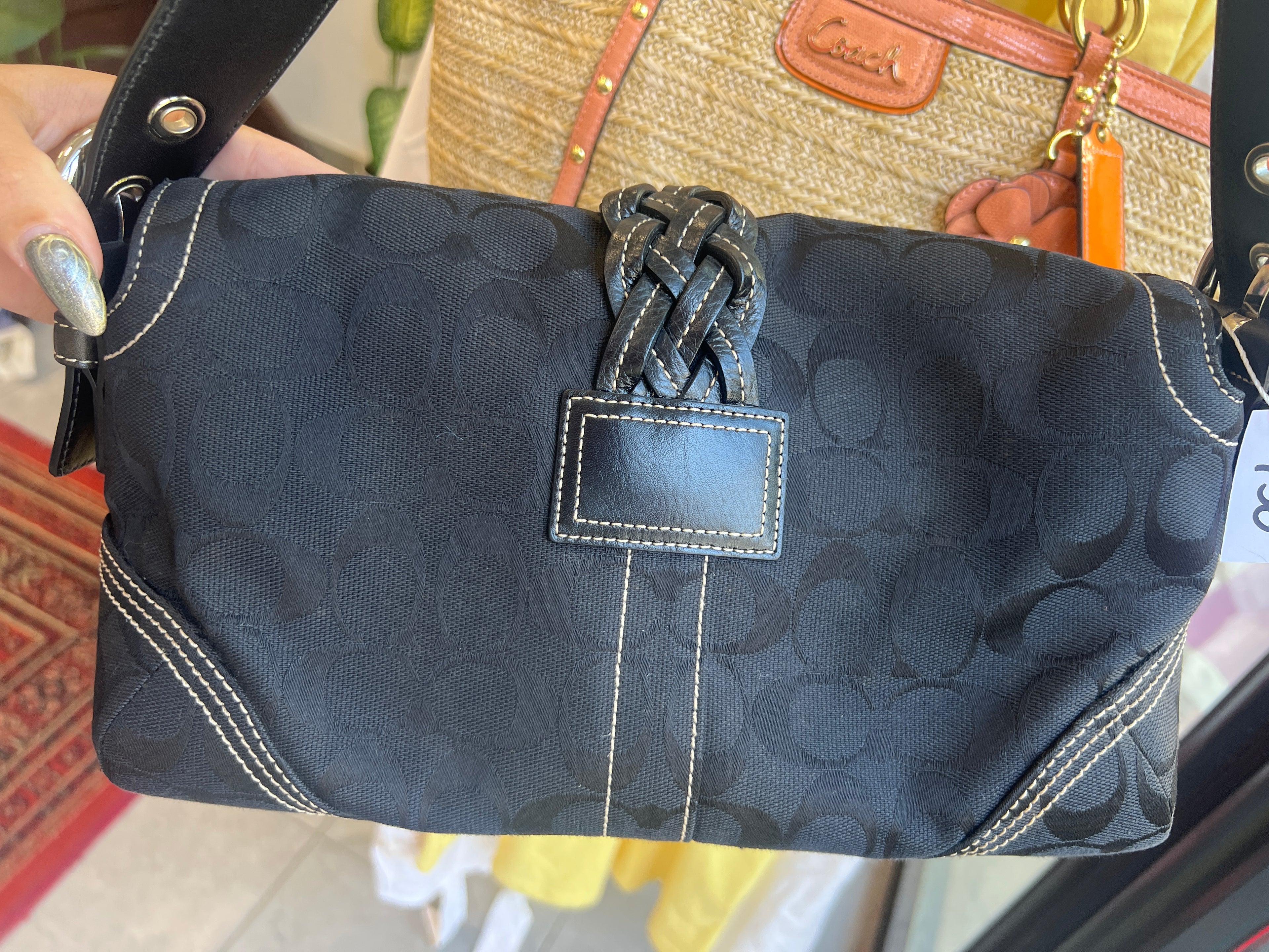 Coach Soho Signature Flap in Black