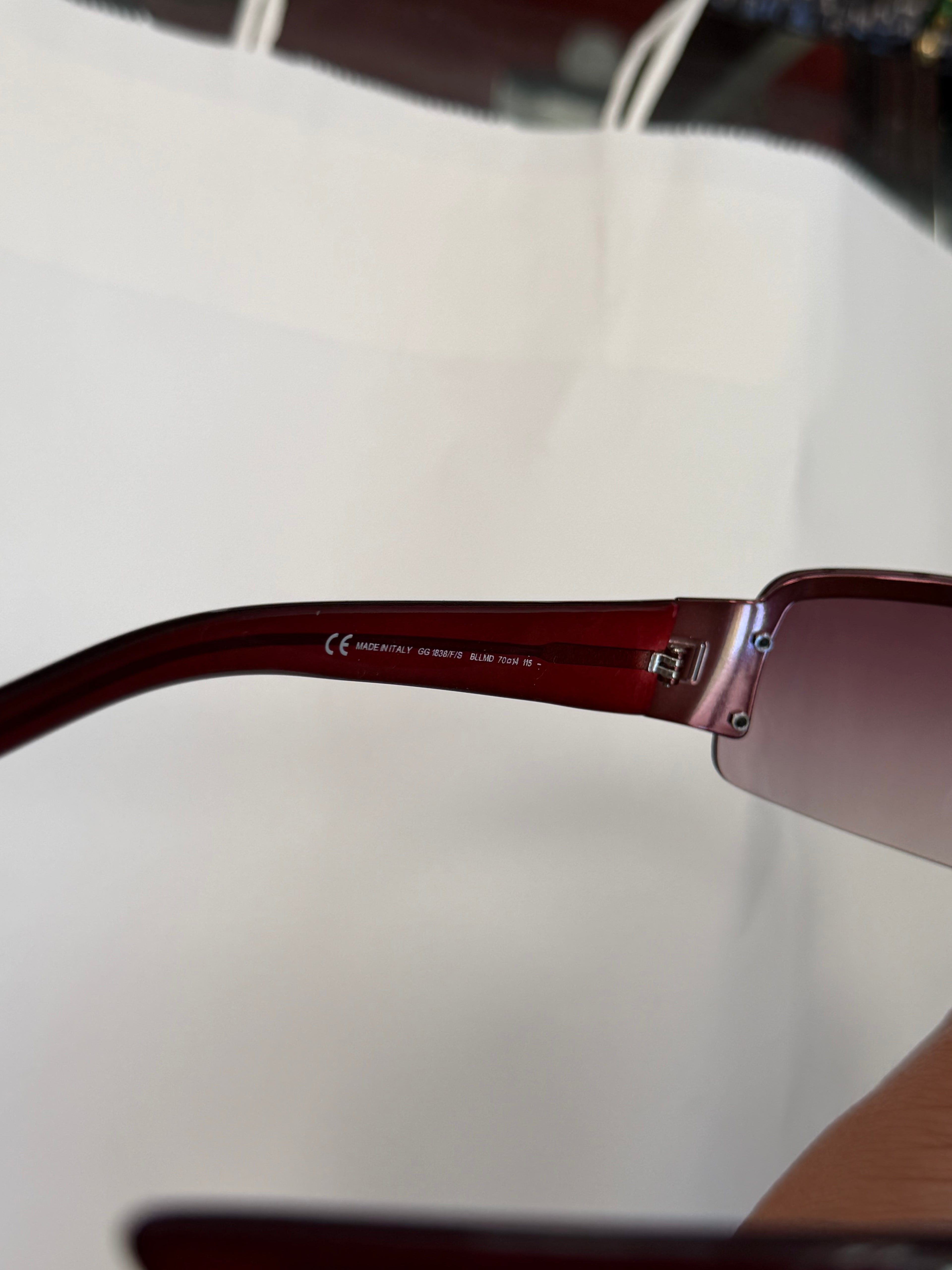 Gucci Studded GG Sunglasses in Dark Purple