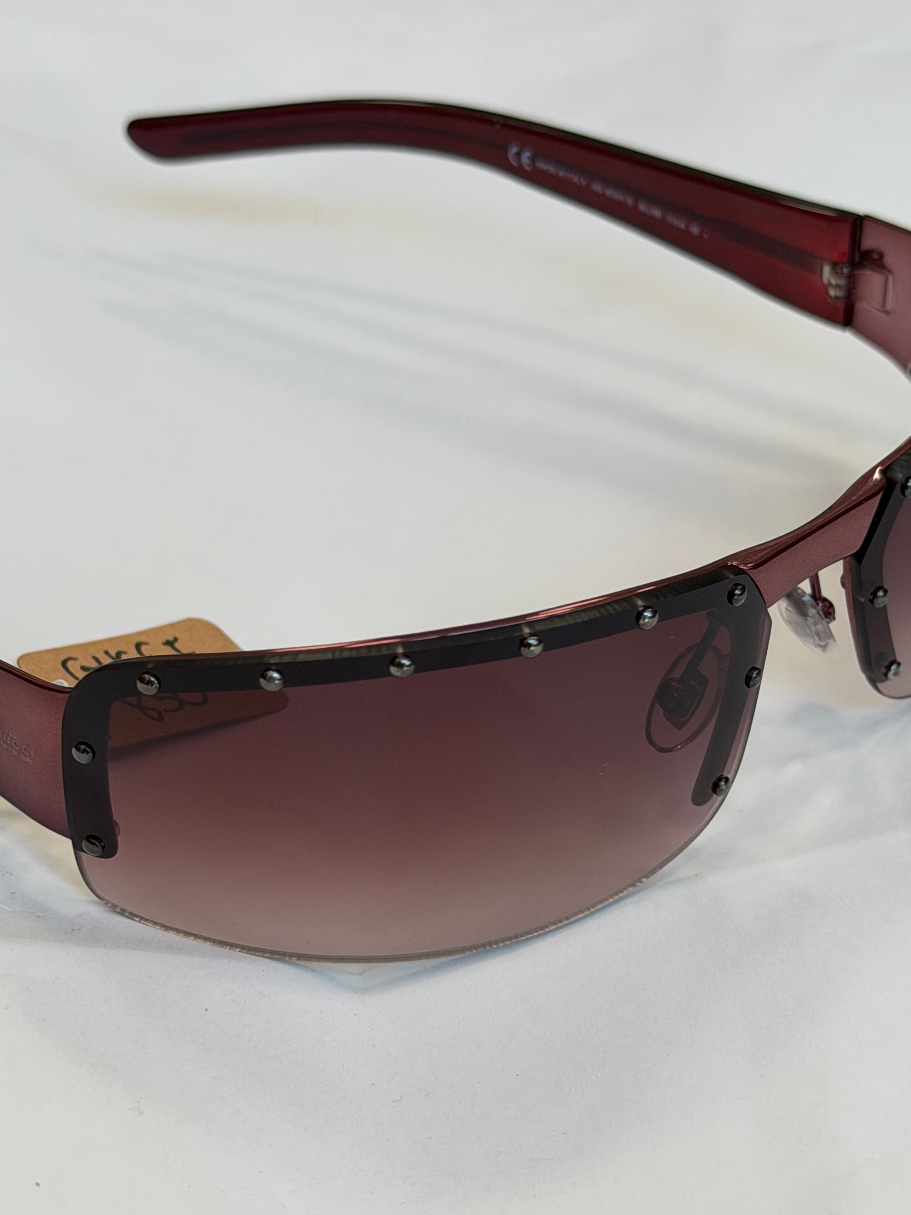 Gucci Studded GG Sunglasses in Dark Purple