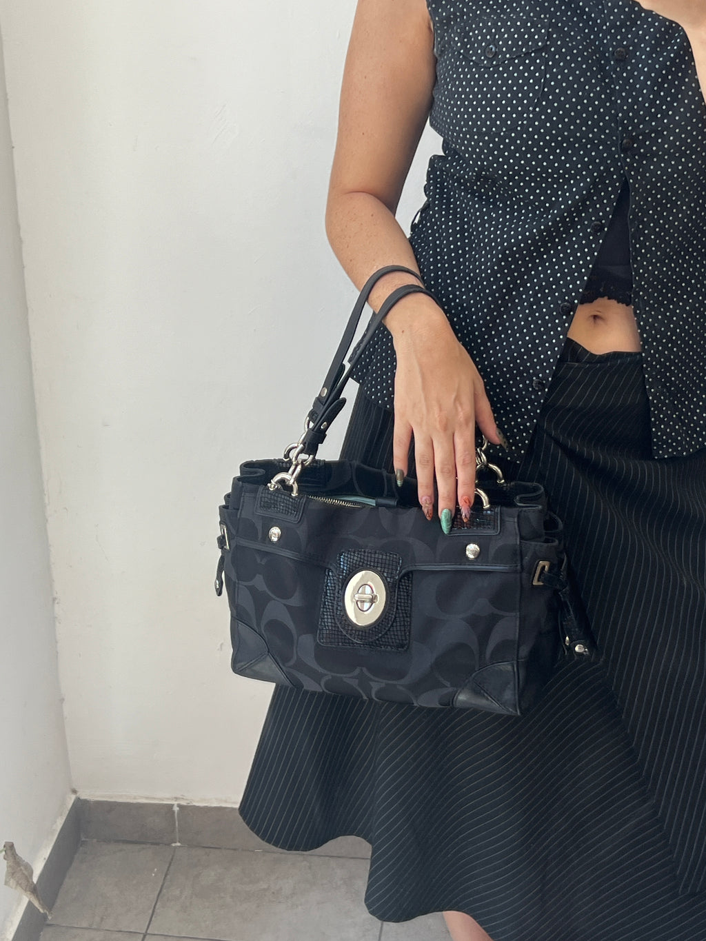 Coach Phython
Signature Satchel Jacquard Leather in Black