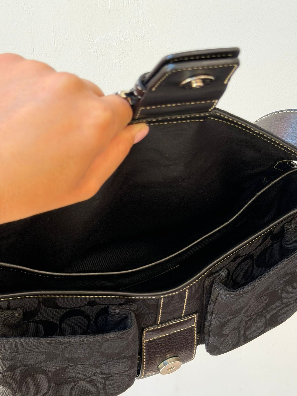 Coach Soho Signature Flap in Black